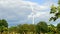 Modern wind turbines generating sustainable energy on the field video 4k