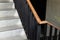 Modern wood handrail in the building - design/interior