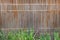 Modern wooden brown lath decoration with grass