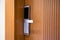 Modern wooden looking steel door, electronic security lock system