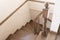 Modern wooden stairs in loft interior. Interior with stairs. Straight staircase with railings