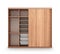 Modern wooden wardrobe with open doors.