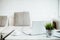 Modern work table with blank computer laptop and accessories in home office studio.Freelance designer or blogger concepts ideas.