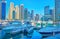 Modern yachts and motor boats in Dubai Marina, on March 7 in Dubai, UAE