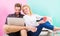 Modern young people leisure internet surfing. Spending great time together. Couple cheerful spend leisure with laptop