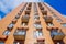 Moderne multy-storey apartment facade of residential building. The view from the top down.