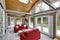 Modernized living room with red sofas.