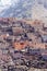 Modest traditional berber village with cubic houses in Atlas mountains, Morocco