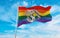 modified flag of the Northern Mariana Islands state, USA with rainbow LGBT pride flag at cloudy sky background on sunset,