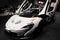 Modified track white McLaren P1 displayed in Dubai Car Show - high-performance exotic cars