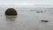 Moeraki boulders in the Pacific Ocean waves