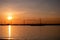 Moerdijk Netherlands, sunset winth windmills by the lake Vokerak river in Holland windmill energy sunset