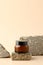 Moisturizer cream jar on stone podium. Natural beauty product design, face skincare concept