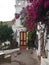 Mojacar, Spain, August 27, 2017: Old tavern with white wall and flowers in the streets of Mojacar, Almeria