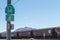 MOJAVE, CALIFORNIA: Sign for California State Highway 14, with train in background