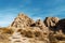 Mojave Desert rock formations under clue sky