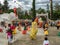 Mojigangas and children dancing at Calenda San Pedro in Oaxaca.