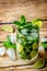 Mojito coctail with fresh mint leaves and lime slice