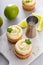 Mojito cupcakes with lime and coconut garnished with mint