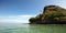 Mokolii island [also known as Chinamans Hat] as seen from the water on the North Shore of Oahu Hawaii USA