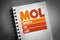 MOL - Middle of Life acronym on notepad, business concept background