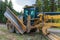 The moldboard of a Caterpillar 14M Motor Grader parked near Pass Lake in British Columbia, Canada - April 30, 2019