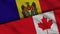 Moldova and Canada Flags, Breaking News, Political Diplomacy Crisis Concept