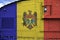 Moldova flag depicted on side part of military armored tank closeup. Army forces conceptual background