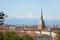 Mole Antonelliana tower and Turin rooftops seen from the hills in a summer day in Italy