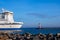 Mole and ferryboat on the Baltic Sea coast in Warnemuende, Germany