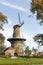 Molen De Valk windmill at Leiden, Netherlands. Sunny day and sky with clouds.