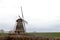 .The Molen van Waardenburg is a hexagonal thatched ground sailor, a grinded flour mill along the Waalbandijk river dike and owned