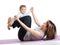 Mom with baby doing gymnastics and fitness exercises