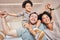 Mom, dad and boy on shoulders, piggyback and portrait in home with smile, holding hands and solidarity. Interracial