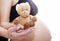 Mom and dad prepare bear doll for a new life