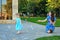 Mom and daughter blow bubbles