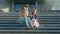 Mom and daughter eating ice cream in a park. mother and child. relaxing happy family