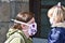 Mom and daughter with facemasks against coronavirus.