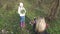 Mom and daughter on the first spring walk in the forest.