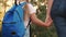 Mom and daughter go to school. happy family education concept. schoolgirl with mom and daughter go hand in hand to