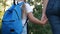 Mom and daughter go to school. Happy family education concept. Schoolgirl with mom and daughter go hand in hand to