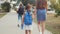 mom and daughter go to school. happy family school education concept. schoolgirl with mom go hand in hand to school on