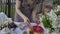 Mom and daughter have breakfast outdoors in the apple orchard in the spring. Happy family concept