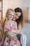 Mom and daughter hugging, smiling, decoration, decor, lifestyle, family, family values