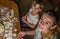 Mom and daughter are making flour out of flour to cook dumplings