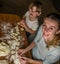 Mom and daughter are making flour out of flour to cook dumplings