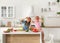 Mom and daughter prepare a salad in the kitchen