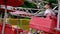 mom and daughter ride a carousel