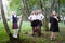 Mom and daughters who are schoolgirls in uniform near the school in Russia on September 1. Girls in the city in serious