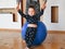 Mom does body exercises at home with her baby. Using a fitness ball